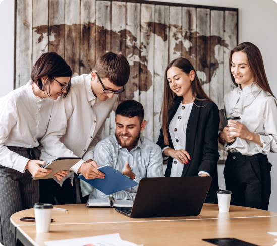 Group of people discussing a project around a table